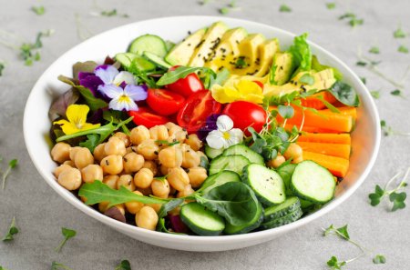 Photo for Vegan Buddha Bowl with Chickpeas, Avocado and Fresh Vegetables, Healthy Eating, Tasty Vegetarian Meal - Royalty Free Image