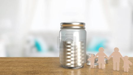 Foto de The wood family plate and jar coin for earning or saving concept in family. The earning for budget in  family - Imagen libre de derechos
