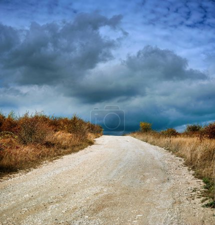 Transportation road in quarry limestone road, quarry, thunderstorm sky