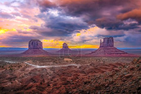 Photo for The sunset between the West and East Mittens in Monument Valley on the border of Arizona and Utah. - Royalty Free Image