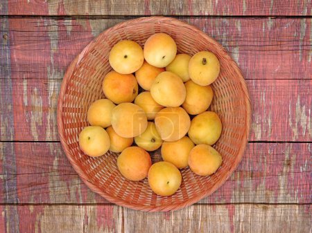 Photo for Close-up shot of Apricots On The Wooden Background - Royalty Free Image