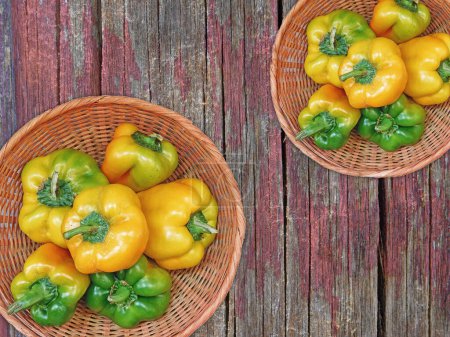 Photo for Peppers On The Wooden Background top view - Royalty Free Image