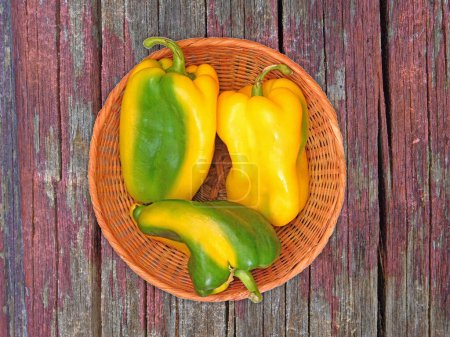 Photo for Peppers On The Wooden Background top view - Royalty Free Image