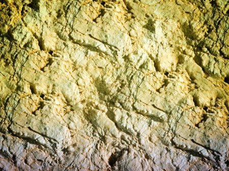 Photo for Close-up shot of yellow tinted stone texture for background - Royalty Free Image