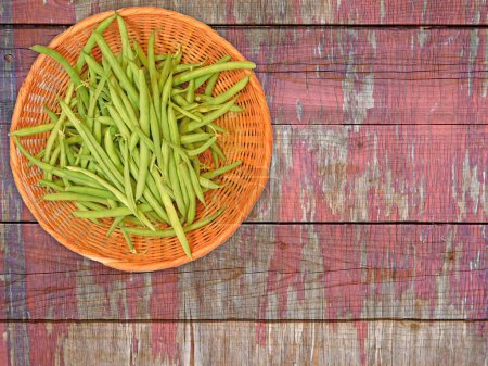 Photo for Beans in bowl On Wooden Background top view - Royalty Free Image