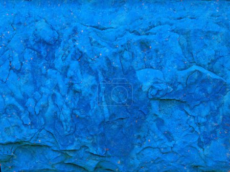 Téléchargez les photos : Gros plan de la texture de pierre bleue teintée pour le fond - en image libre de droit