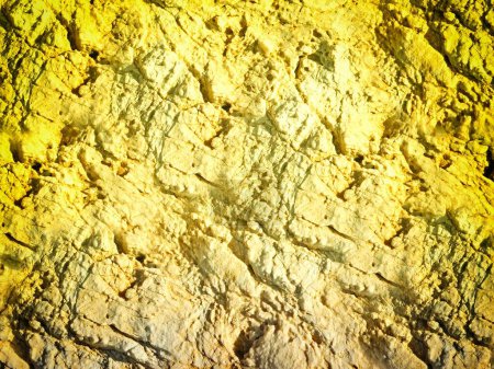 Téléchargez les photos : Gros plan de la texture de pierre teintée jaune pour le fond - en image libre de droit