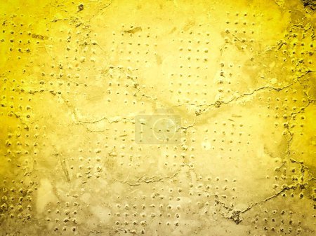 primer plano de textura de piedra teñida de amarillo para el fondo
