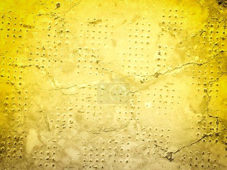 primer plano de textura de piedra teñida de amarillo para el fondo
