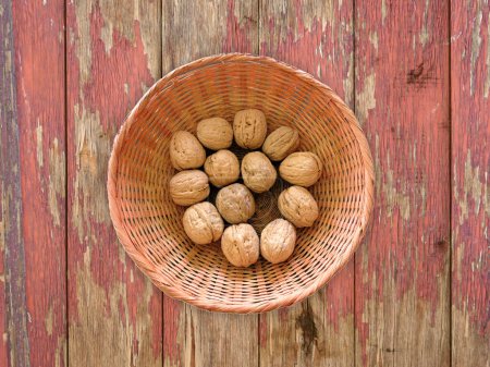 Photo for Nuts On The Wooden Background - Royalty Free Image