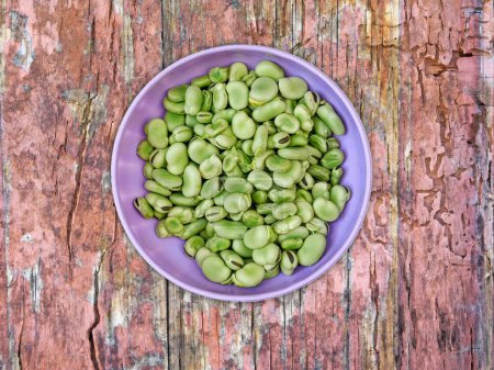 Photo for Beans in bowl On Wooden Background top view - Royalty Free Image