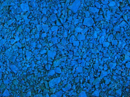 Téléchargez les photos : Plan rapproché de la texture de pierre teintée bleue pour le fond - en image libre de droit