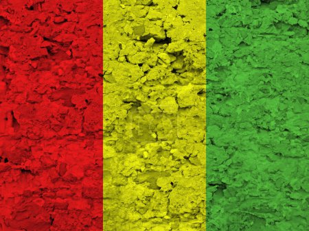 Guinean flag on scratched rough stone texture