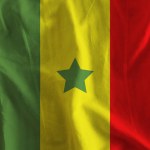 Senegal flag on wavy surface of fabric 