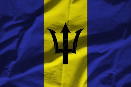 Barbadian flag on wavy surface of fabric 