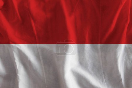 Foto de Bandera de Indonesia en la superficie ondulada de la tela - Imagen libre de derechos