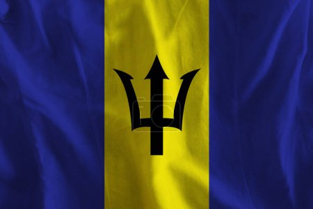 Foto de Bandera de Barbados en la superficie ondulada de la tela - Imagen libre de derechos