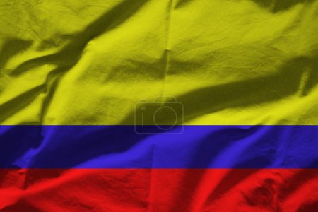 Foto de Bandera de Colombia sobre superficie ondulada de tela - Imagen libre de derechos