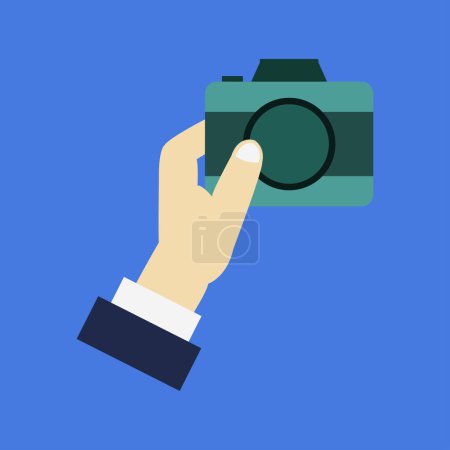 Téléchargez les illustrations : Main tenant l'icône de la caméra sur fond bleu - en licence libre de droit