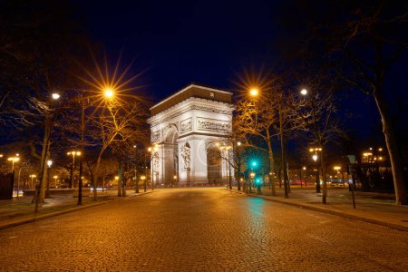Photo for The Triumphal Arch is one of the most famous monuments in Paris. It honors those who fought and died for France. - Royalty Free Image