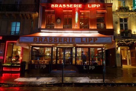 Photo for Paris, France-December 31 , 2023 :The brasserie Lipp is a famous establishment on the boulevard Saint Germain - Royalty Free Image