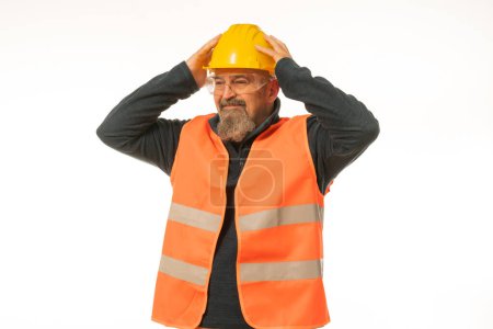 Téléchargez les photos : Professional engineer inspector foreman at work , construction manager working in manufacturing technology, man at work concept, on white background in yellow helmet and orange vest. - en image libre de droit