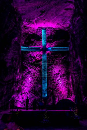 Photo for Salt Cathedral of Zipaquira in Colombia, colorfully illuminated cross in the wall. - Royalty Free Image