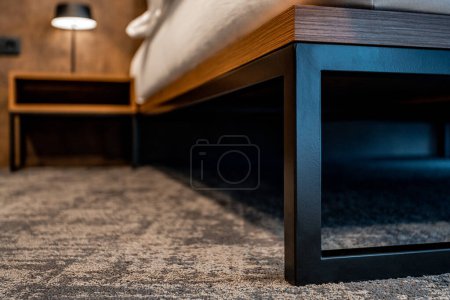 detail of the bed construction in the hotel room. High quality photo