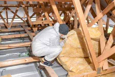 Photo for Thermal insulation of roof spaces. - Royalty Free Image
