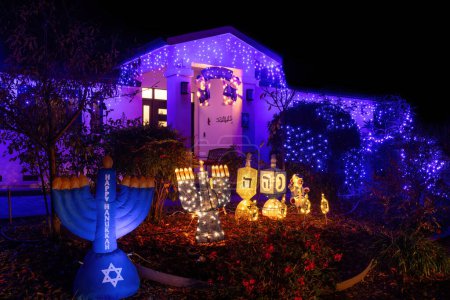 Photo for Happy Hanukkah Night Decorations with Menorahs and Dreidels. - Royalty Free Image