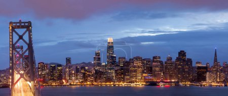 Panoramic Views of San Francisco Bay Bridge and Waterfront at Twilight.
