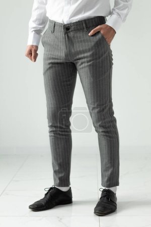 Photo for Bulgaria - 03 19 2024: Grey thight male pants for every occasion. - Royalty Free Image