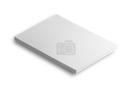 Foto de Pila de papel con sombra aislada sobre fondo blanco. - Imagen libre de derechos