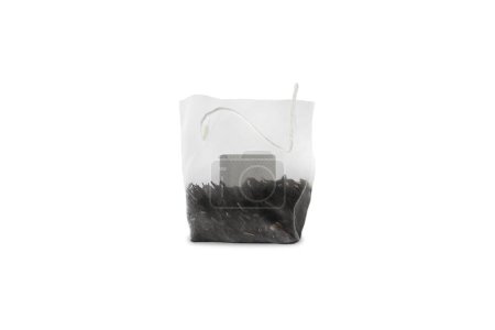 Foto de Bolsa de té con hojas y hierbas maqueta aislada sobre fondo blanco. renderizado 3d. - Imagen libre de derechos
