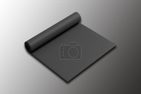Foto de Negro laminado yoga Matt mockup aislado en un fondo oscuro.3d renderizado. - Imagen libre de derechos