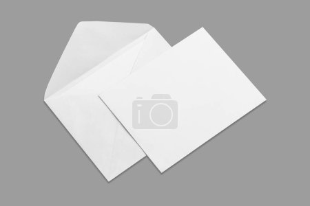 Empty Blank white envelope with card mockup isolated on a grey background.3d rendering. Greeting or invitation card design.