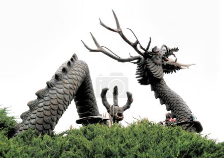 Photo for Busan, South Korea - May 2019: A bronze statue of a dragon at Haedong Yongungsa Temple - Royalty Free Image