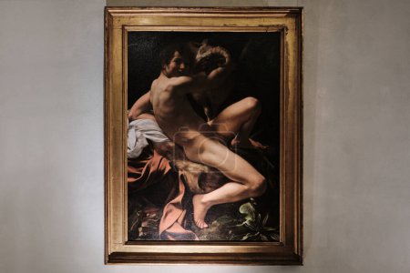 Téléchargez les photos : Rome, Italie - 4 novembre 2023 : Saint Jean Baptiste, Jeune avec un bélier peint Caravage en 1602, Musées du Capitole - en image libre de droit