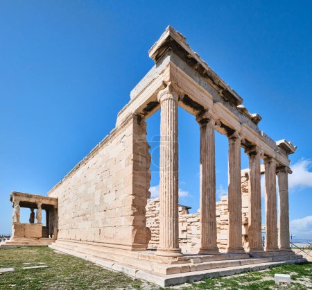 Photo for Athens, Greece - March 02, 2024: The Erechtheion (or Erechtheum, 406 BC) with Caryatids - ancient Greek temple on the north side of the Acropolis. Erechtheion dedicated to both Athena and Poseidon - Royalty Free Image
