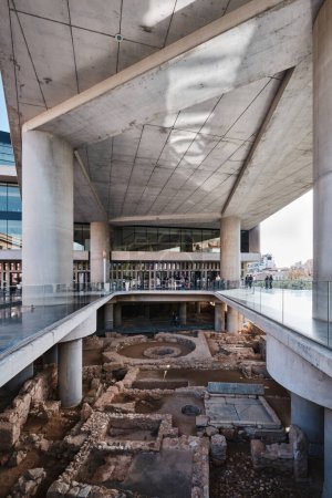Photo for Athens, Greece - March 02, 2024: Entrance of the New Acropolis Museum and archaeological remains in Athens. Designed by the Swiss-French Architect Bernard Tschumi - Royalty Free Image