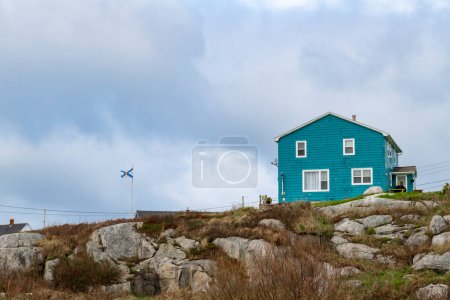 View of a wooden house in the fishing village of Peggy's Cove, in Southern Coast of Nova Scotia, Canada.