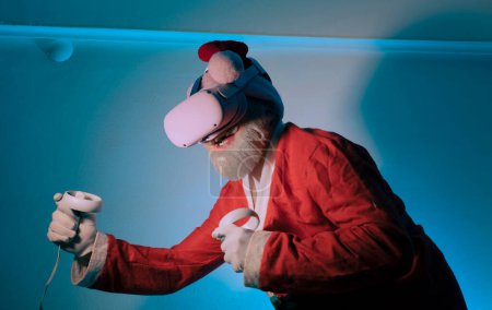 Photo for Santa wear vr helmet gadget device equipment  watching realistic experience. Elderly gray-haired mustache bearded Santa Claus experiencing virtual reality playing in video game - Royalty Free Image