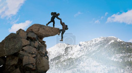 Photo for A hiker climber helps a friend not to fall from the cliff to reach the mountain top render 3d - Royalty Free Image