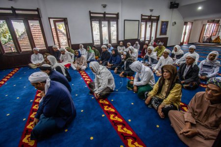 Photo for The Thariqat Naqsyabandiyah Al Kholidiyah Jalaliyah congregation carried out Eid prayers 1444 H in Bogor, West Java, Indonesia, on April 20, 2023 - Royalty Free Image