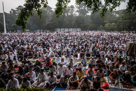 Photo for Muslim community carry out the Eid prayer 1444 H on April 21, 2023 at Sempur Field, Bogor, West Java, Indonesia - Royalty Free Image