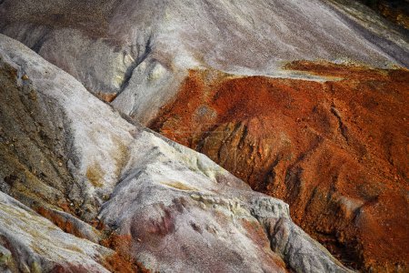 A striking landscape of multicolored geological formations at the Rio Tinto mines, marked by the passage of time and extraction