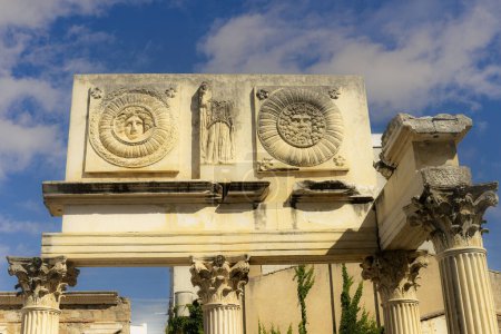 Photo for Detailed view of the ornate columns and intricate reliefs at the Roman Forum in Merida, Spain. - Royalty Free Image