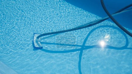 Photo for Swimming pool cleaning kit. Bottom vacuum cleaner. - Royalty Free Image