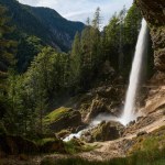 Panoramic view of the Pericnik waterfall in Slovenia. The Alps mountains in the background