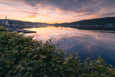 Landscape of Lake Baldeneysee on the Ruhr River before sunrise. Dawn over the lake in the city of Essen in Germany.